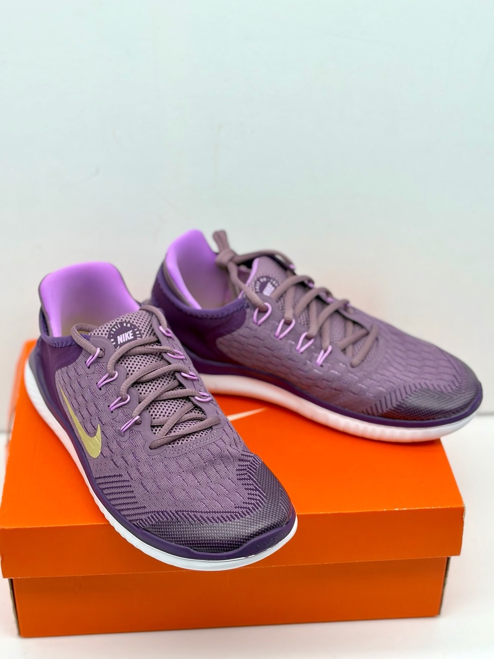 Nike Women's Lavender Purple Running Shoes with Gold Swoosh Women’s size 8